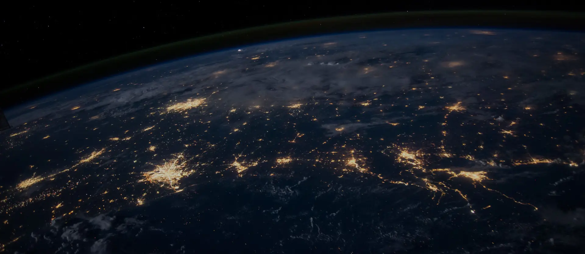 Night view of Earth from space showing city lights